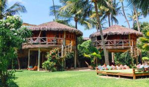 rustic bungalows of the boutique pousada Vila Kalango, located in the village of Jericoacoara in Brazil