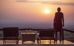 Masai guide watching the sunset at the exclusive luxury Lentorre Lodge in Kenya