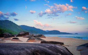 Beautiful tropical beach with giant rocks in Picinguaba, Brazil