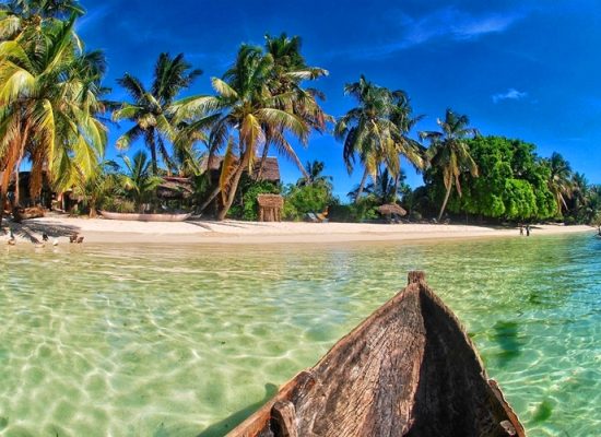 boat sailing in the turquoise waters of Ile Sainte Marie, Madagascar