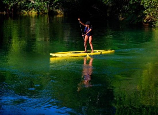 paddling on the green river in Bonito, Brazil